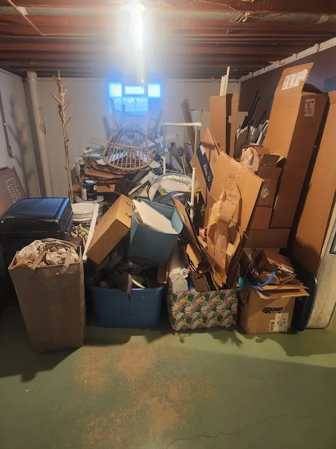 Roll-off dumpster container at job site for 20 Yard Dumpster Rental in Gulf Shores